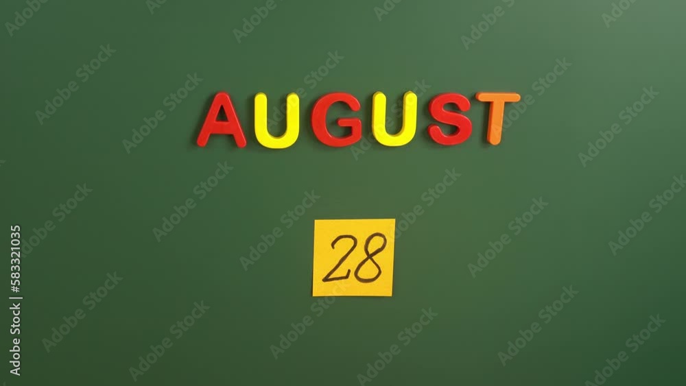 Hand sticking a sticker 28 August calendar day on school board. 28 date of august. Twenty eighth day of august. 28th date number. 28 day calendar. Twenty eight date. Emirati womens, National Red Wine Hand sticking a sticker 28 August calendar day on school board. 28 date of august. Twenty eighth day of august. 28th date number. 28 day calendar. Twenty eight date. Emirati womens, National Red Wine