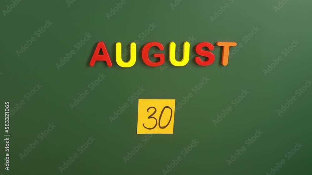 Hand sticking a sticker 30 August calendar day on school board. 30 date of august. Thirtieth day of august. 30th date number. 30 day calendar. Thirty date. Zafer Bayrami Victory Day Turkey Hand sticking a sticker 30 August calendar day on school board. 30 date of august. Thirtieth day of august. 30th date number. 30 day calendar. Thirty date. Zafer Bayrami Victory Day Turkey