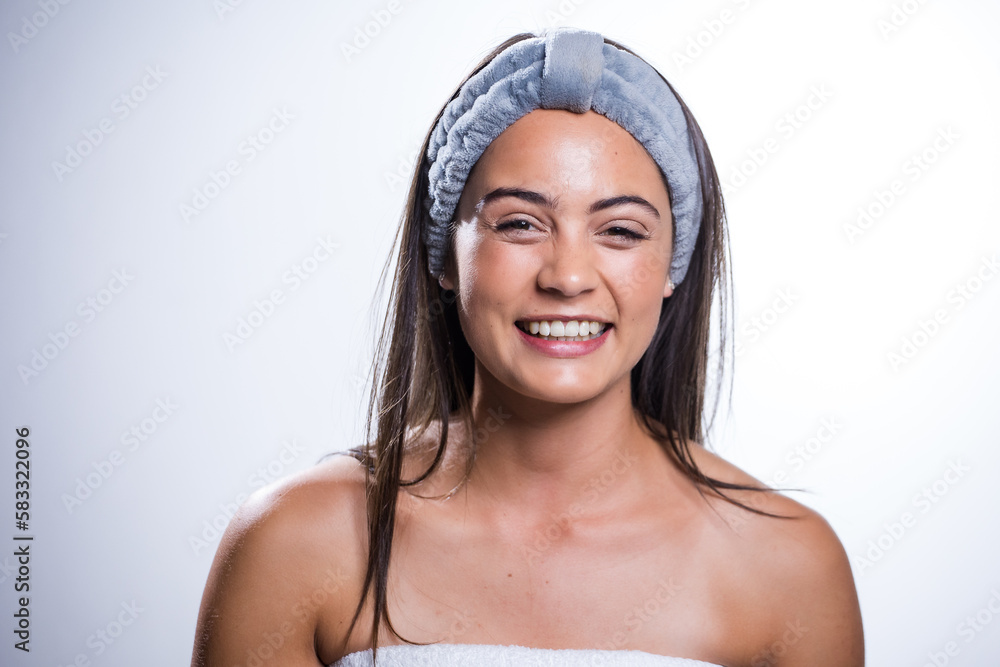 Glowing Beauty: Young Woman's Beauty Routine on White Background Glowing Beauty: Young Woman's Beauty Routine on White Background