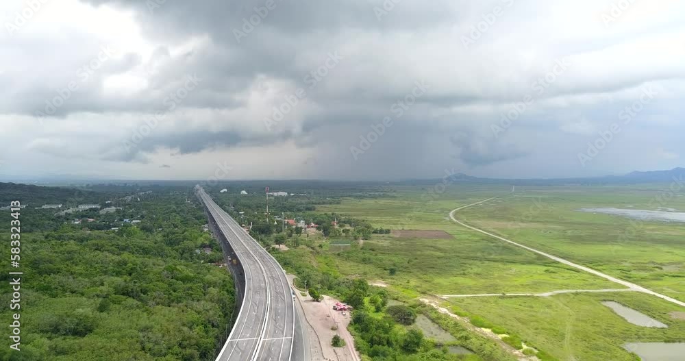Beautiful arial view of rice farm in Countryside. Farms and road, Tropical Rain forests with the lake. Beautiful arial view of rice farm in Countryside. Farms and road, Tropical Rain forests with the lake.