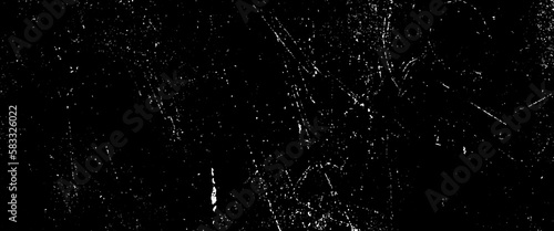 White dust and scratches on a black background, the texture of dirt on the glass, dust and scratches design, aged photo editor layer. Black grunge abstract background. Copy space.