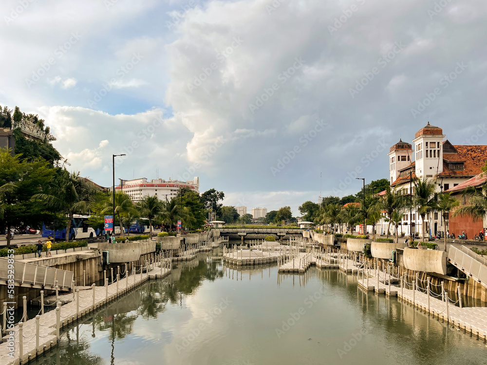 Krukut River in Jakarta, Indonesia, March 2023: a canal in the Kota Tua area, the historical place of Sunda Kelapa Harbor