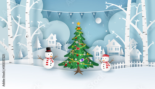 Merry Christmas or Happy New Year card in winter landscape with houses, building, Santa Claus mascot and Snowman on blue background. Vector illustration art in paper cut design.