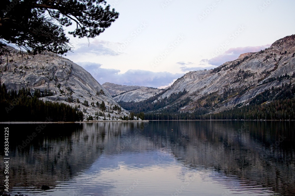Dusk falls on serene Tenaya Lake in the high country of Yosemite National Park