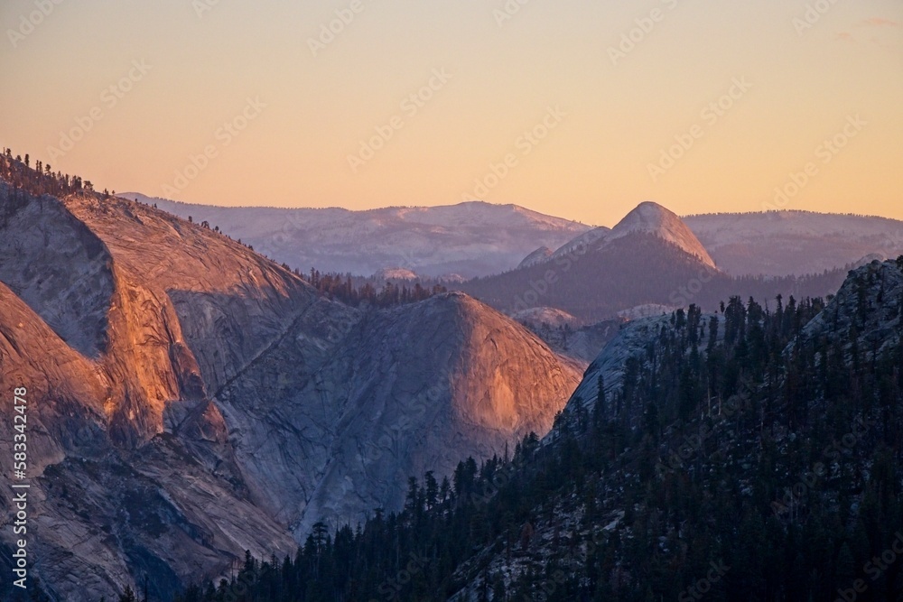 Sunset falls over the high country of Yosemite, where California Highway 120 connects the Central Valley of California on the western side with the Eastern Sierra to the east.