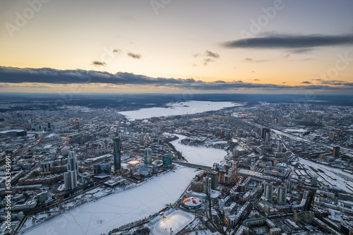 Yekaterinburg aerial panoramic view in Winter at sunset. Yekaterinburg city and pond in winter. © Dmitrii Potashkin