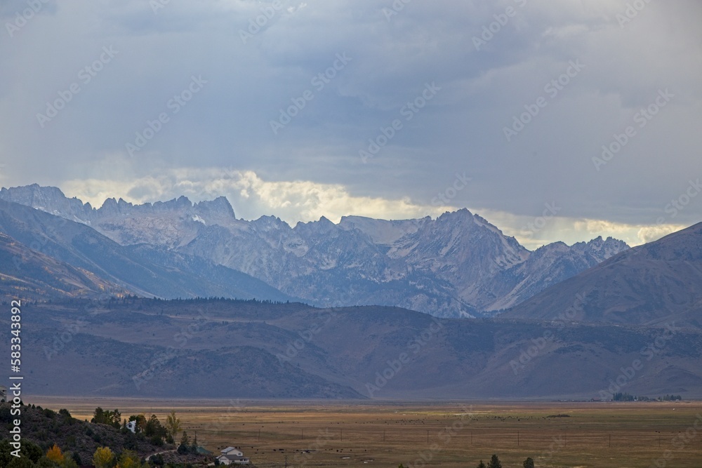 Sharp peaks rise over the Eastern Sierra, a region at the base of the steep eastern side of the Sierra Nevadas, as seen from the Travertine Hot Springs.