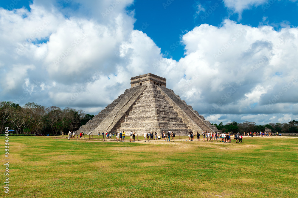 Kukulkan pyramid with unrecognizable tourists people, Chichen Itza, Yucatan, Mexico. Kukulkan pyramid with unrecognizable tourists people, Chichen Itza, Yucatan, Mexico.