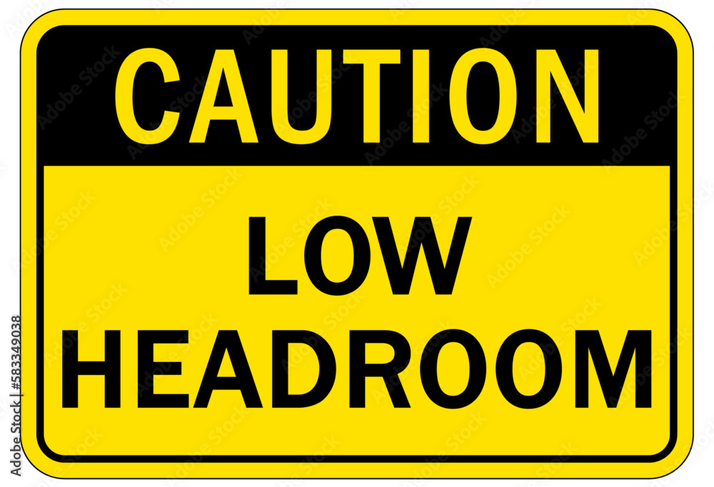 Low headroom warning sign and labels
