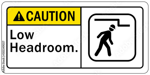 Low headroom warning sign and labels