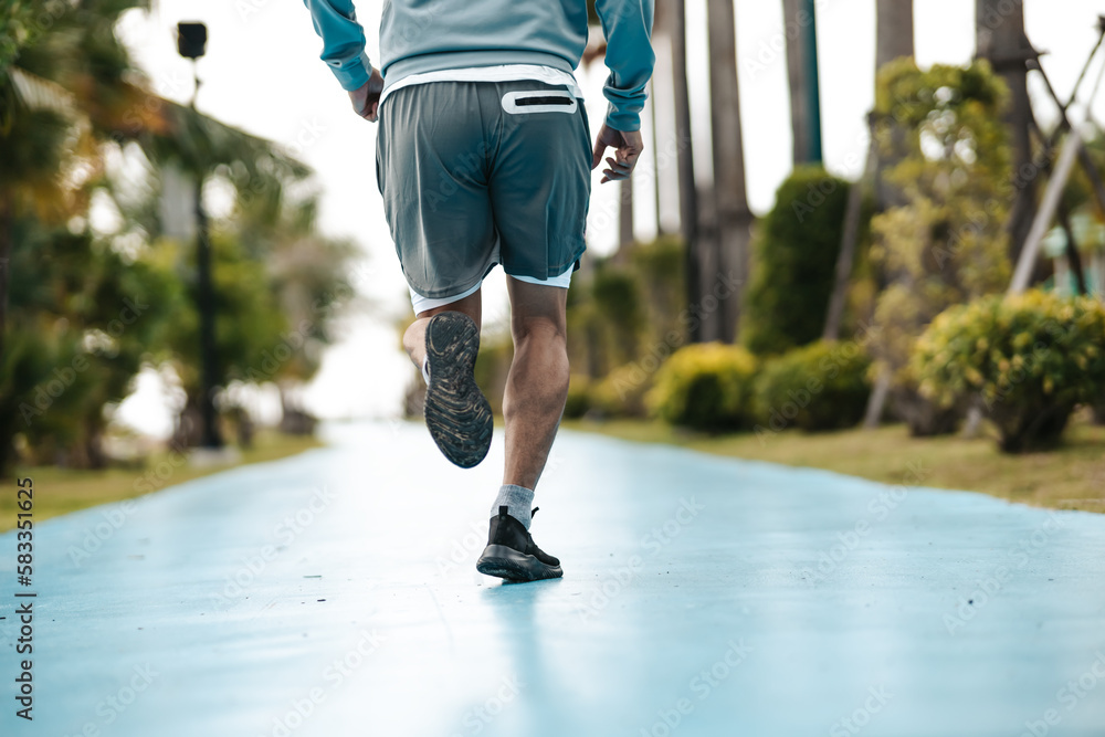 healthy lifestyle young fitness man running in the park. Outdoor workout, Healthy lifestyle concept. healthy lifestyle young fitness man running in the park. Outdoor workout, Healthy lifestyle concept.