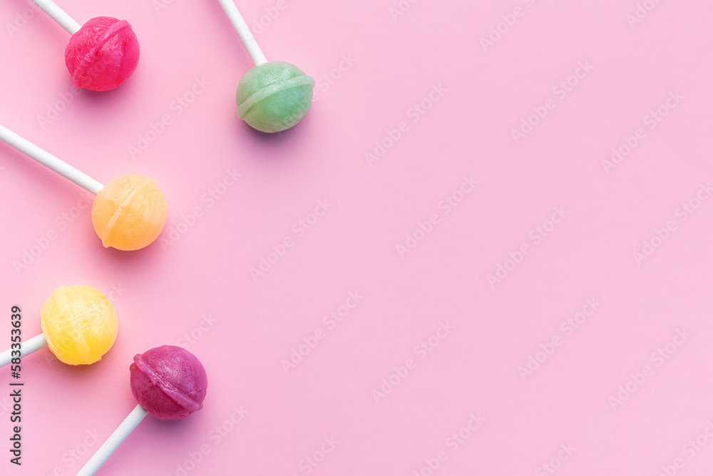 Sweet lollipops on pink background Sweet lollipops on pink background
