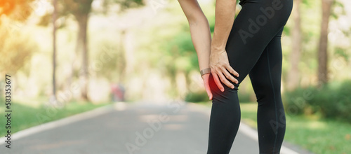 adult woman with muscle pain during running. runner have knee ache due to Runners Knee or Patellofemoral Pain Syndrome, osteoarthritis and Patellar Tendinitis. Sports injuries and medical concept photo