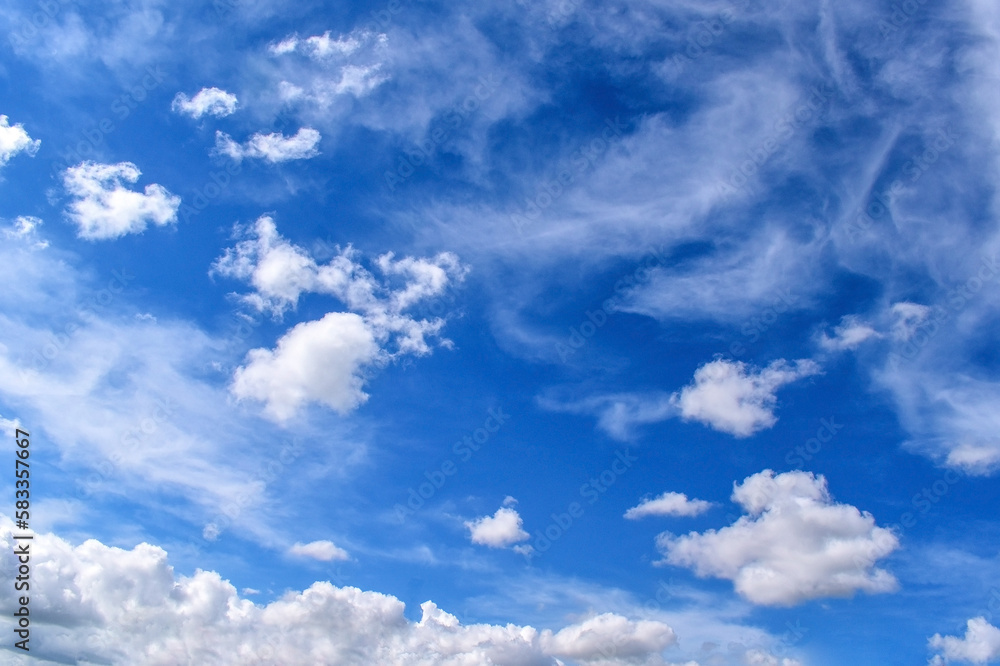 Blue sky with white fluffy clouds in a sunny day. Beautiful sky in the morning. Concept of new life beginning, freedom of life and peaceful. Cloudscape background. Cumulus clouds with sky background. Blue sky with white fluffy clouds in a sunny day. Beautiful sky in the morning. Concept of new life beginning, freedom of life and peaceful. Cloudscape background. Cumulus clouds with sky background.