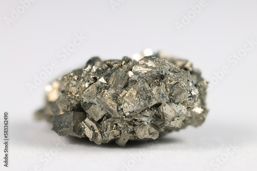 Cubic crystal of pyrite. Pyrite is an iron sulfide and the most abundant sulfide mineral.