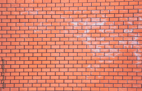 Red brick wall as an abstract background. Texture