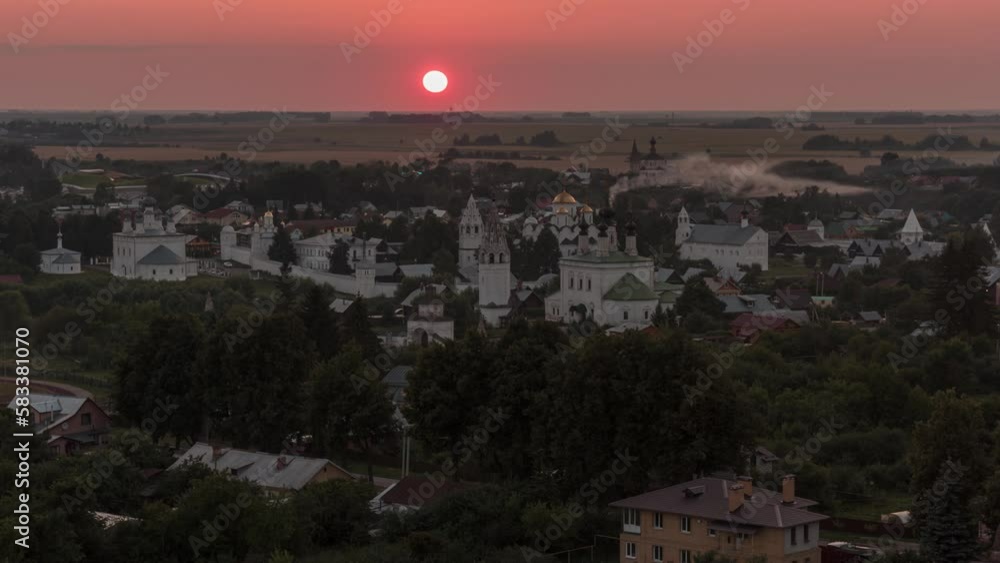 View of Suzdal and Intercession Monastery from the bell tower at sunset. Time-lapse. View of Suzdal and Intercession Monastery from the bell tower at sunset. Time-lapse.