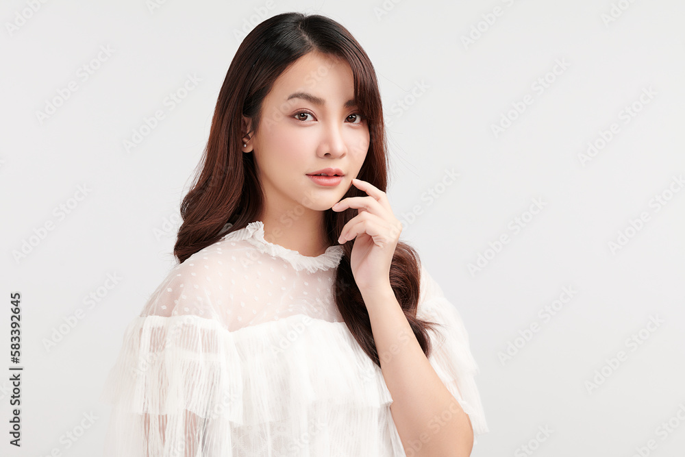 Beautiful young asian woman with clean fresh skin on white background, Face care, Facial treatment, Cosmetology, beauty and spa, Asian women portrait. Beautiful young asian woman with clean fresh skin on white background, Face care, Facial treatment, Cosmetology, beauty and spa, Asian women portrait.