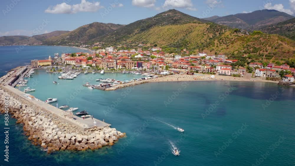 4k drone forward video (Ultra High Definition) of Acciaroli port. Wonderful outdoor scene of Mediterranean coast of Italy. Traveling concept background.