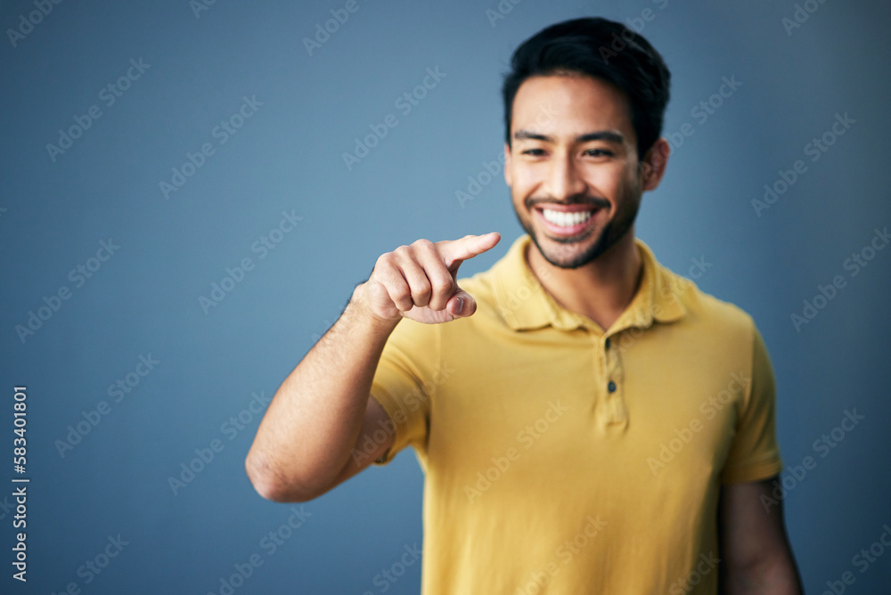 Mockup, smile and Asian man pointing, space and product placement against blue studio background. Japan, male and happy guy with brand development, happiness and suggestion with promotion and choice Mockup, smile and Asian man pointing, space and product placement against blue studio background. Japan, male and happy guy with brand development, happiness and suggestion with promotion and choice