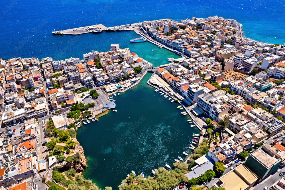 Aerial view of Agios Nikolaos town and Voulismeni lake, Lasithi, Crete island, Greece.