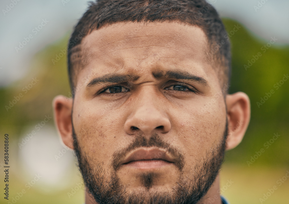 Obraz premium Rugby, focus and portrait of man with serious expression, confidence and pride in winning game. Fitness, sports and zoom on face of player ready for match, workout or competition on grass at stadium.