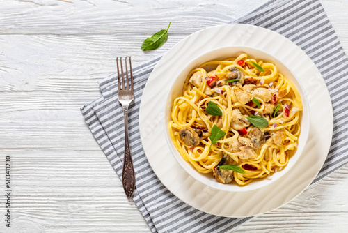 linguine Alfredo with Chicken, Mushroom in bowl