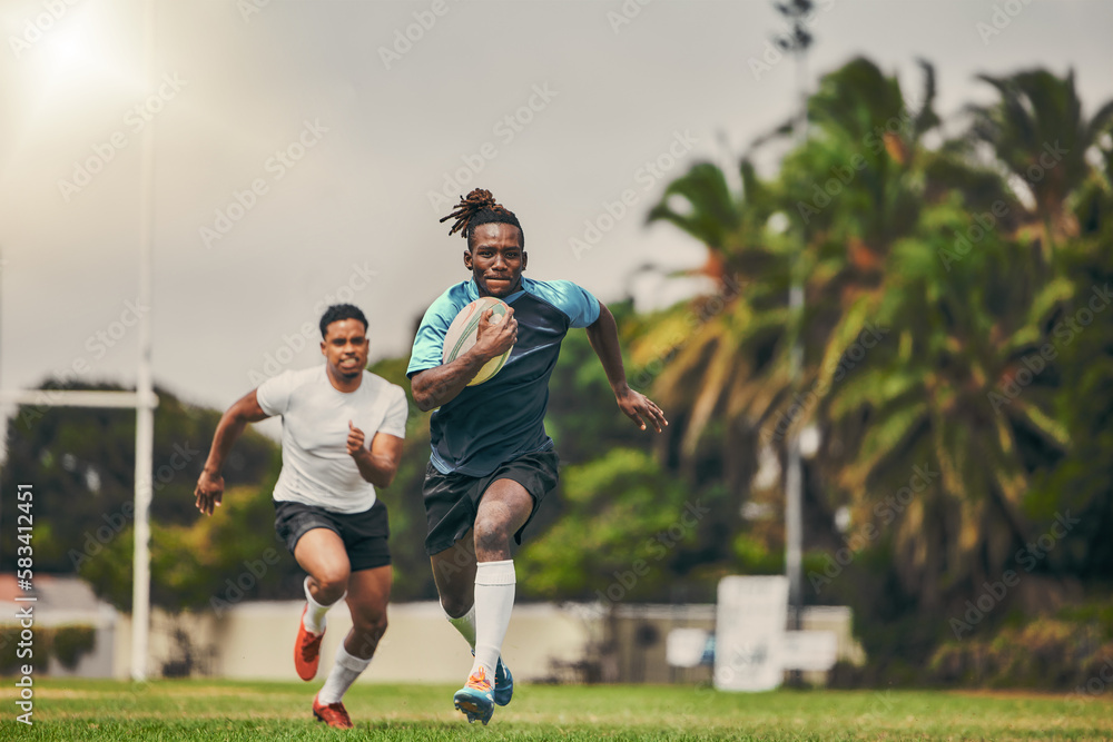 Obraz premium Rugby, chase and black man with ball running to score goal on field at game, match or practice workout. Sports, fitness and motion, player in action and blur on grass with energy and skill in sport.