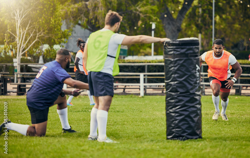 Fotografie Rugby, teamwork and men training on field with equipment ready for match, practice and sports game