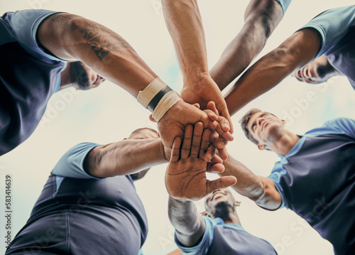 Fototapeta Naklejka Na Ścianę i Meble -  Diversity, team and men with hands together in sports below for support, motivation or goals outdoors. Man sport group piling hand for fitness, teamwork or success in collaboration for match or game