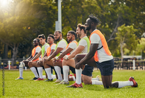 Rugby sport, diversity and men training outdoor on a grass field with a team happy for knee exercise. Athlete group together for fitness, motivation and workout for sports club and strong teamwork