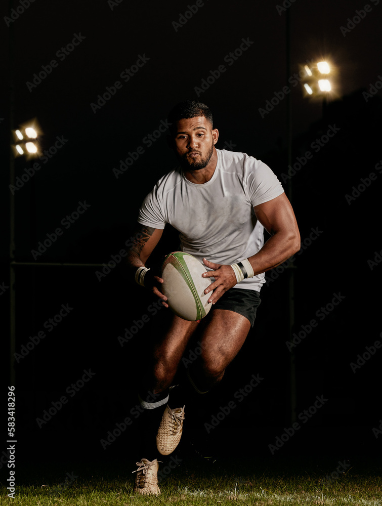 © Delcio/peopleimages.com - Rugby, night and man running with ball to score goal at dark stadium at game, match or practice workout. Sports, fitness and motion, player with action on grass with energy and skill in team sport.