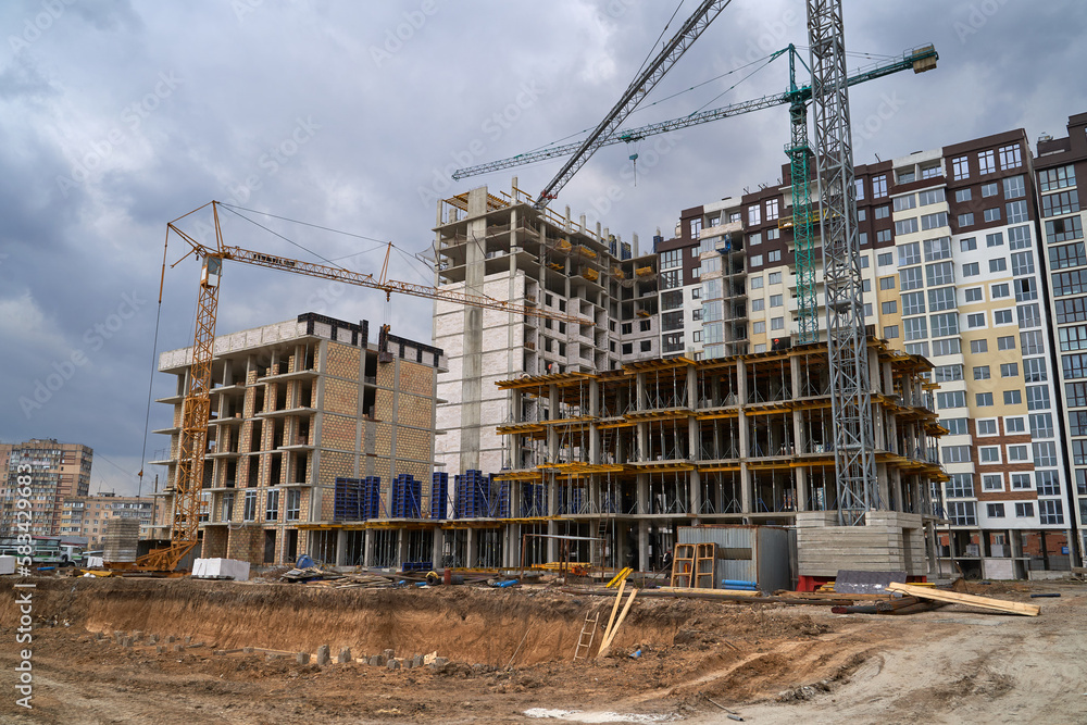 Construction site. High rise Building under construction. Construction of high-rise residential building Construction site. High rise Building under construction. Construction of high-rise residential building