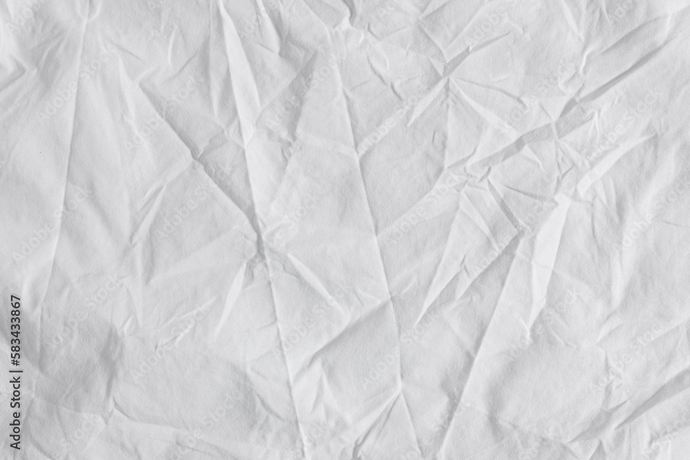 Fototapeta premium Crumpled white fabric as background, top view