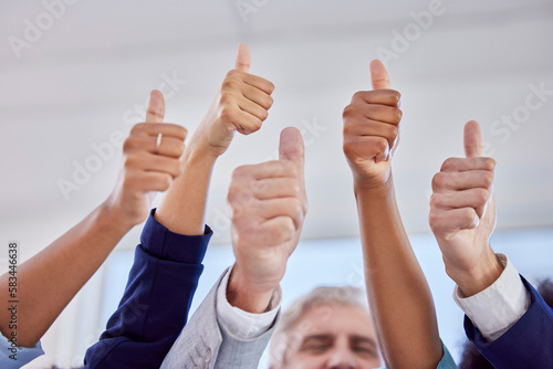 Business people, hands and thumbs up in agreement for success, good job or collaboration at office. Hand of group showing thumb emoji, yes sign or like for teamwork, win or solidarity at workplace