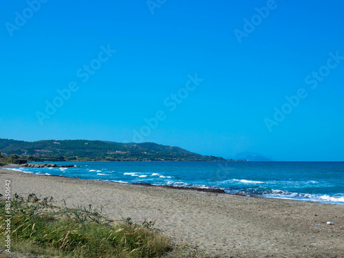 Empty beach on beautiful Rhodes island. Spectacular landscape with sandy coast called amiros beach. Aegean Sea  Greece.
