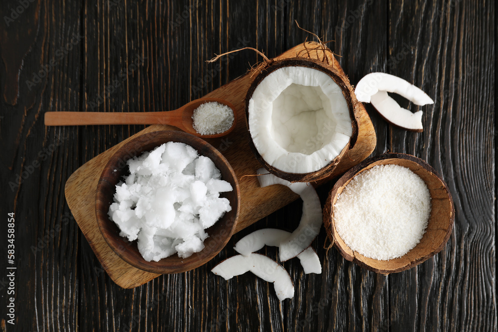 Composition with coconut on wooden background, top view Composition with coconut on wooden background, top view