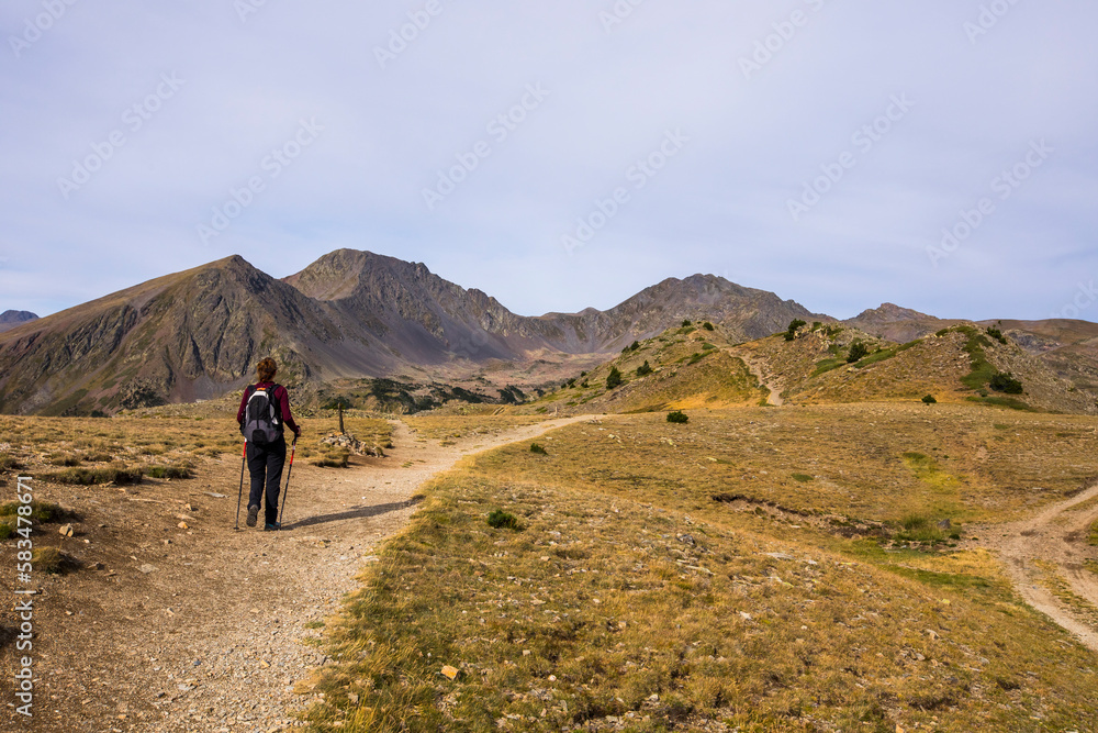 Young hiker girl enjoying in Camporrells, Pyrenees, France