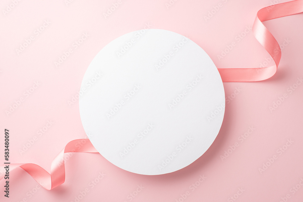 Women's Day concept. Top view photo of white circle and silk ribbon on isolated pastel pink background with copyspace - obrazy, fototapety, plakaty 