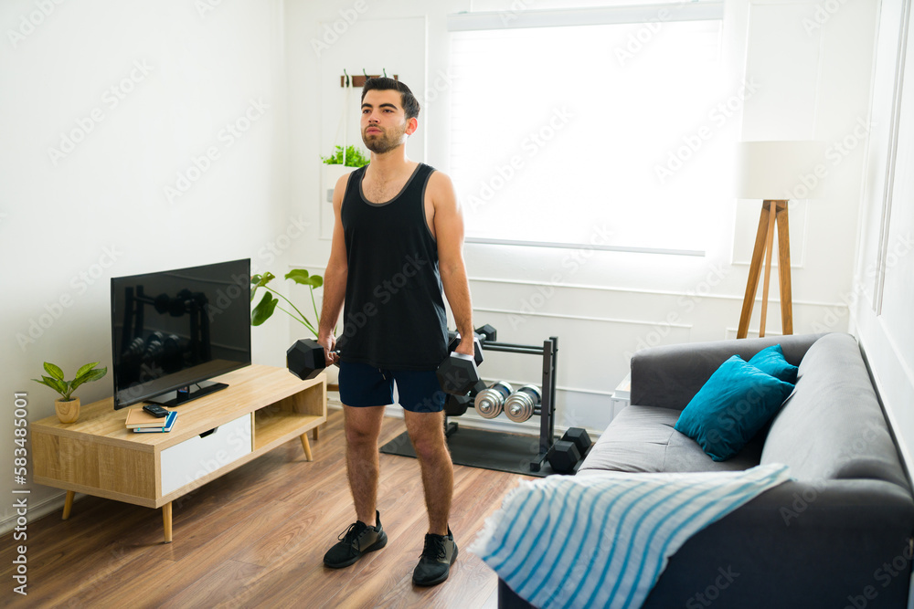 Fitness hispanic man working out lifting weights Fitness hispanic man working out lifting weights