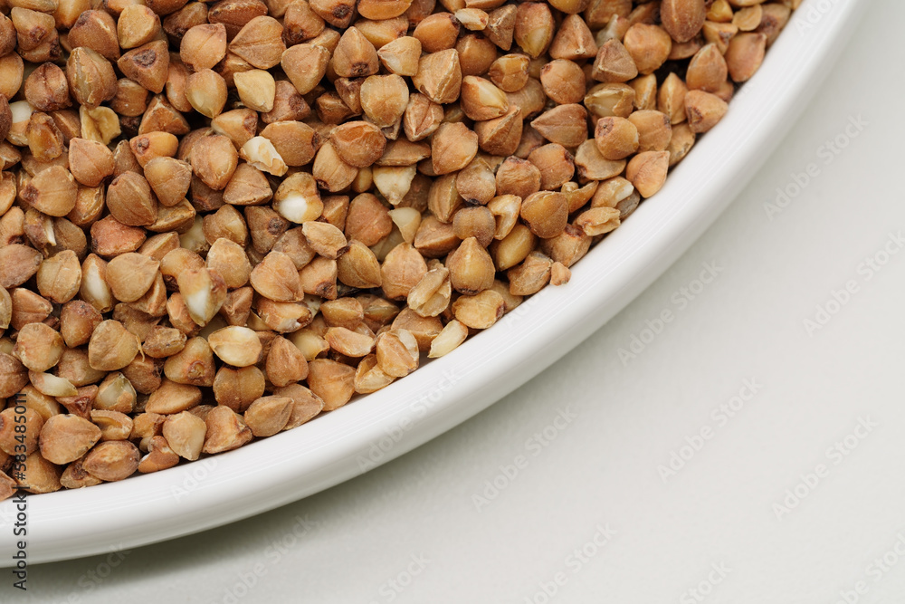 Buckwheat Groats Dry Uncooked Raw Natural Fresh Brown. Roasted buckwheat kernels. Healthy organic food. Background. 