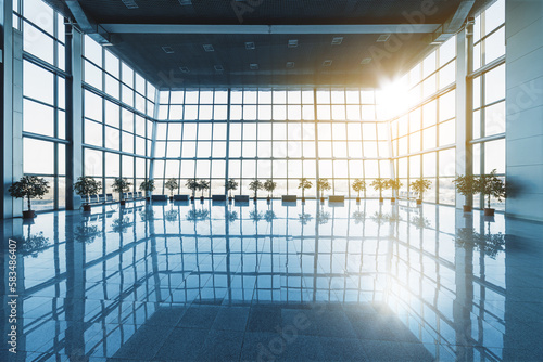 Obraz na płótnie Interior of the modern lobby, terminal or waiting room with glass walls and reflective floor, natural light and flare w salonie