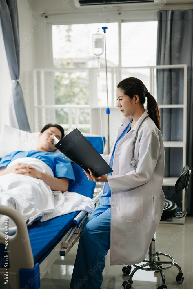 Doctor discussing treatment with male patient talking and laughing sitting on examination bed in clinic or hospital. Doctor discussing treatment with male patient talking and laughing sitting on examination bed in clinic or hospital.