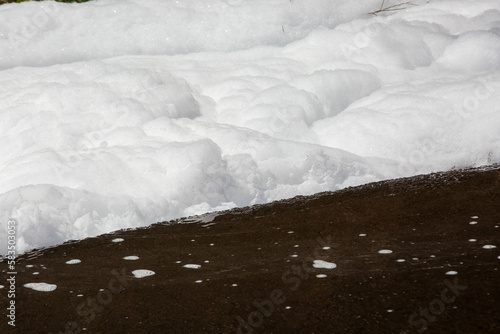 Environmental Hazard: Toxic PFOS Chemical Fire Foam Floating Down the Street, PFAS Firefighting Chemicals