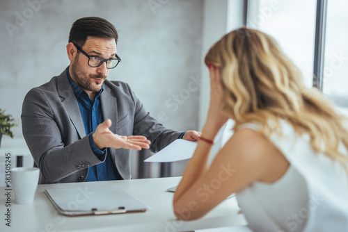 Boss threatening with finger his employee in office. Angry mean boss yelling at employee for missing deadline, executive manager scolding ineffective salesman showing bad work results