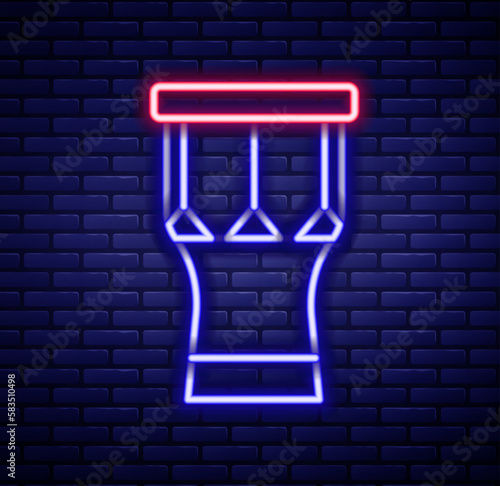 Glowing neon line African percussion drum icon isolated on brick wall background. Musical instrument. Colorful outline concept. Vector