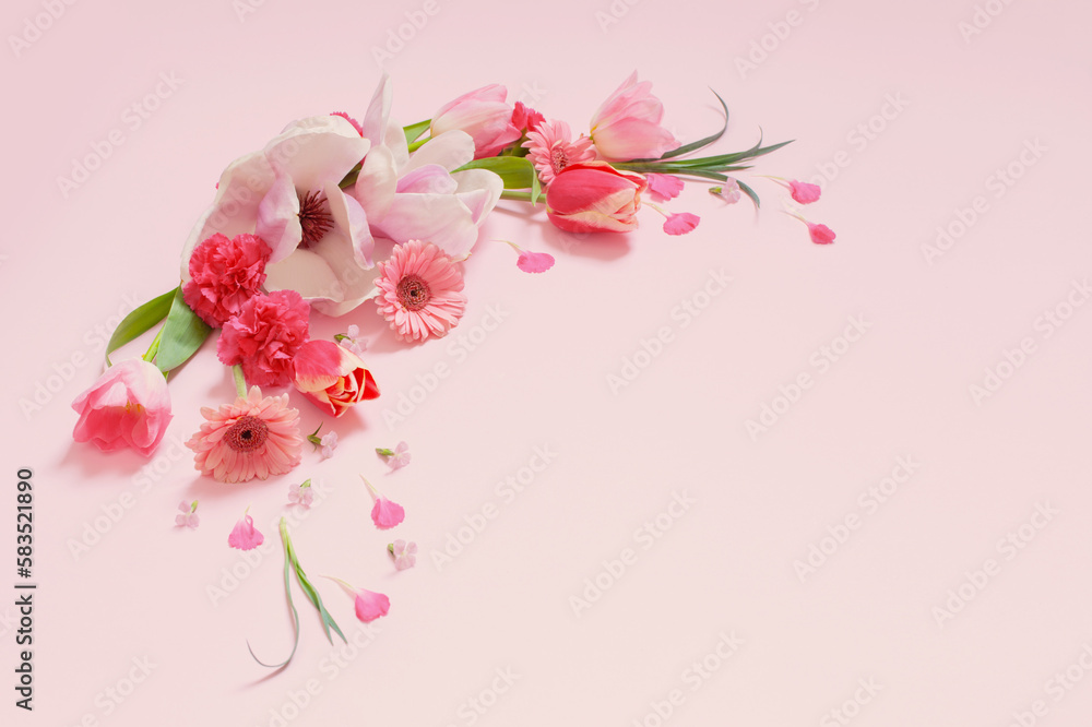 Fototapeta premium beautiful spring flowers on pink background