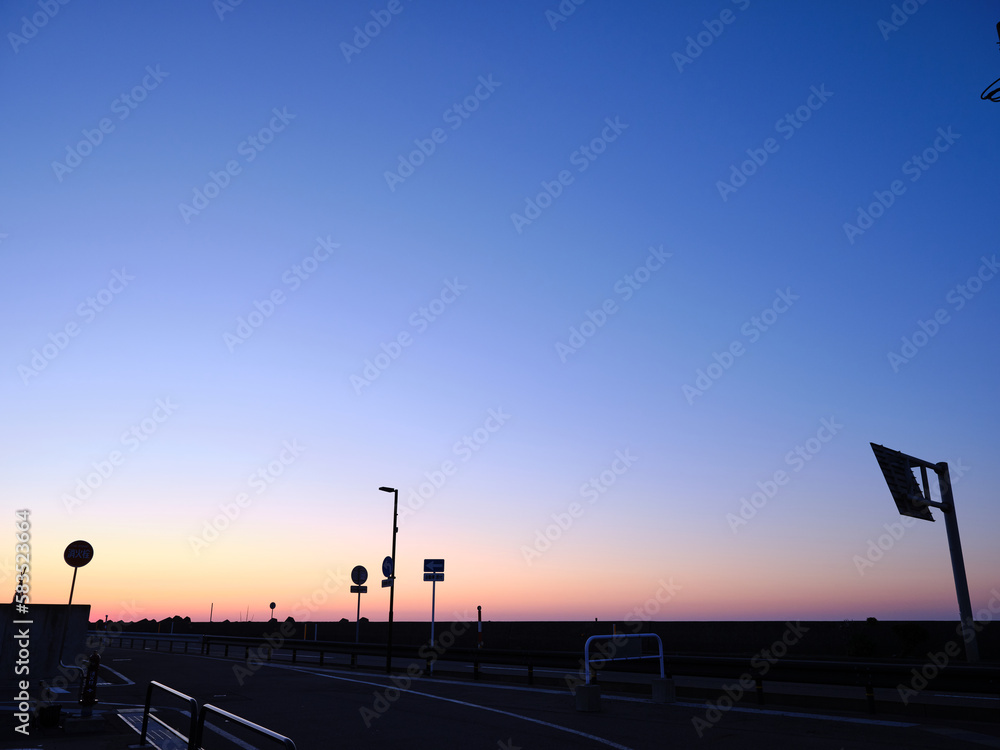 Coastal road dyed in the sunset sky Coastal road dyed in the sunset sky