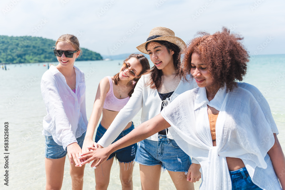 Group of cheerful teenage girl enjoying outdoor activity on the beach summer, Lifestyles on weekend and vacation, Travel concept.