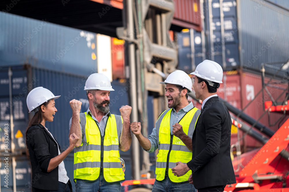 group of businessman, Logistics engineer and inspector and businessman cheer up and happy to about success business deal and project in shipping containerin commercial transport port group of businessman, Logistics engineer and inspector and businessman cheer up and happy to about success business deal and project in shipping containerin commercial transport port